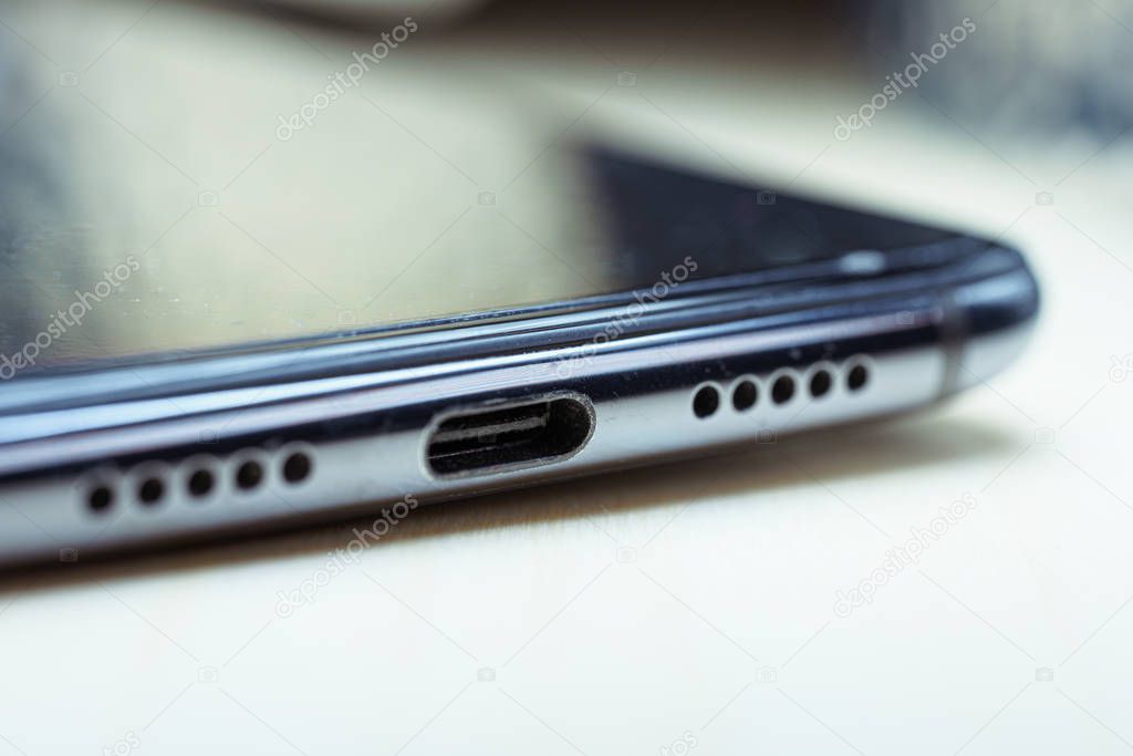 USB-C port on smartphone. Macro view.