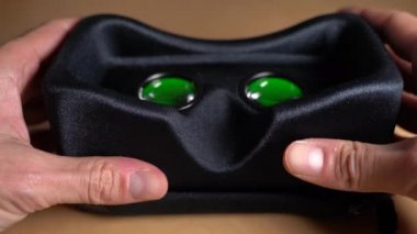 Putting on VR glasses Virtual Reality point of view