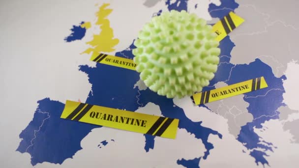 Coronavirus ball falling over an EU map — Stok video