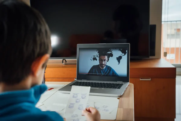 Child studying homework math during his online lesson at home — Stock Photo, Image