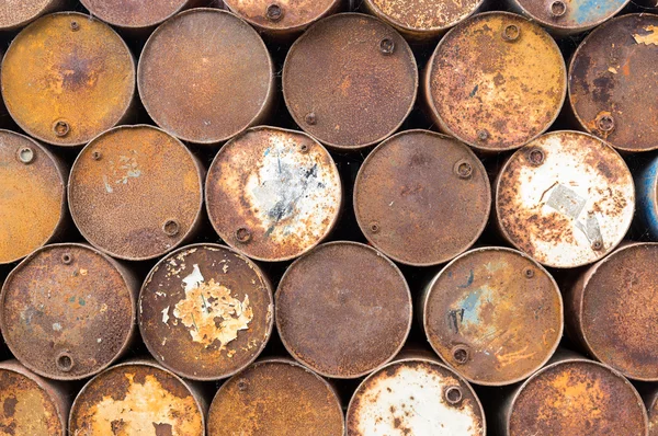 Background of old rusty oil barrels — Stock Photo, Image