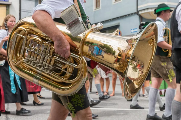 Festival with parade of fanfare and people in traditonal costumes — Stock Photo, Image