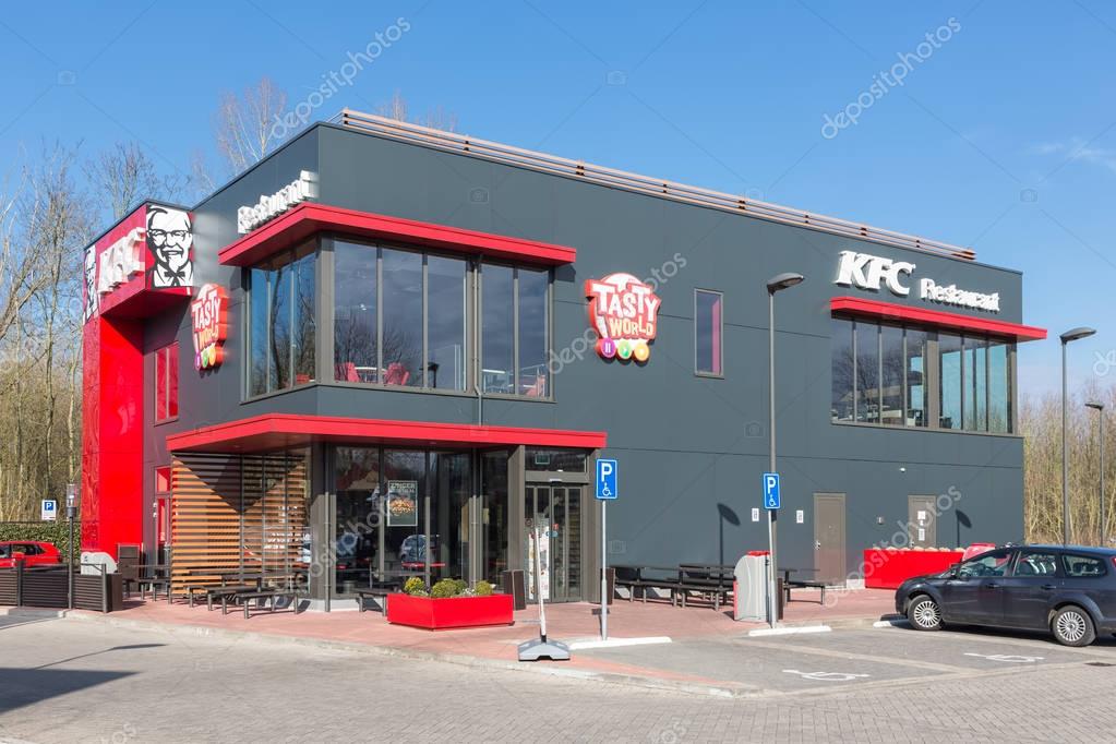 Lelystad, The Netherlands - February 22, 2018: Car park near Dutch motorway with KFC fastfood restaurant