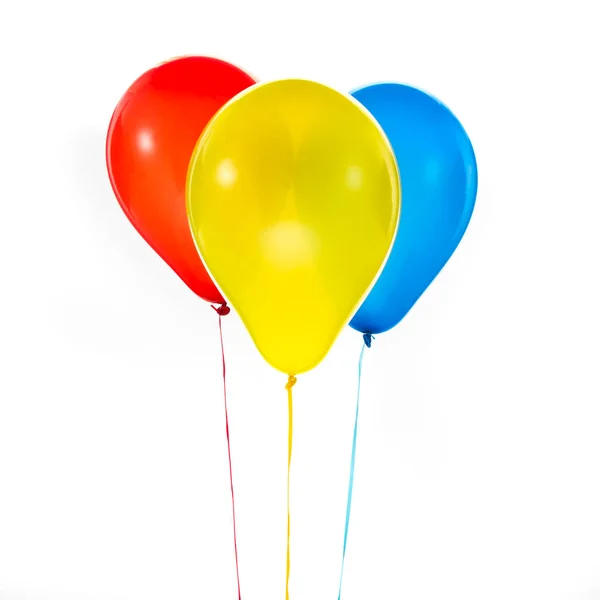 Globos coloridos para cumpleaños y celebraciones aislados sobre fondo blanco — Foto de Stock