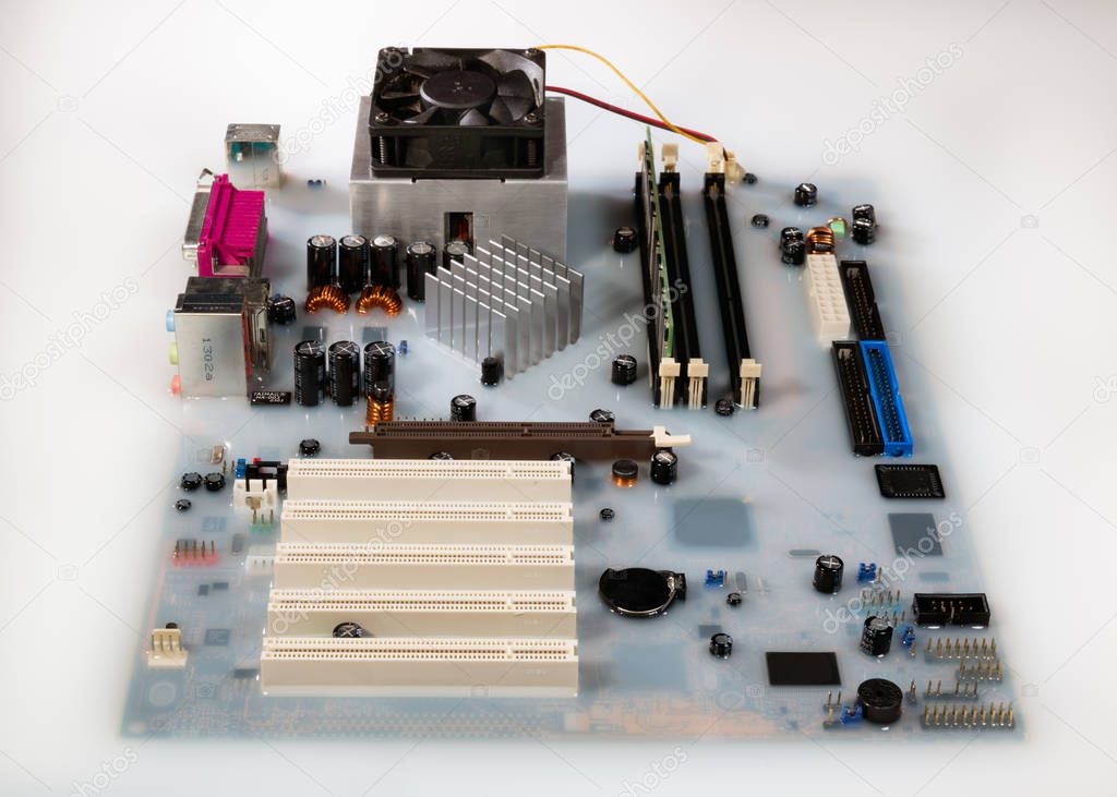 Mainboard card computer flooded by white colored water