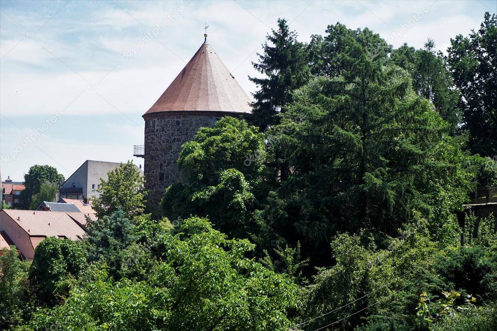 The tower of the tanner bastion Bautzen hidden behind trees