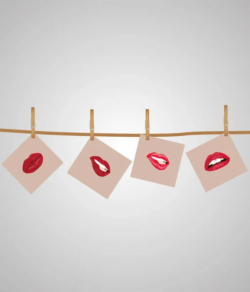 Foto van de lippen hangen aan een touw, wasknijpers greep een foto. Foto lippen tegen een lichte achtergrond. — Stockvector