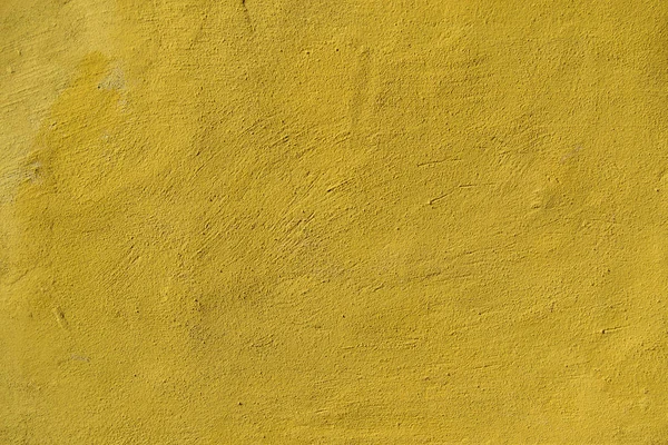 Textura de fondo de hormigón amarillo con restos — Foto de Stock