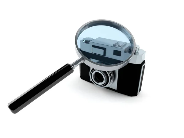 Old camera with magnifying glass — Stock Photo, Image