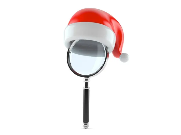 Förstoringsglas med Santa hatt — Stockfoto