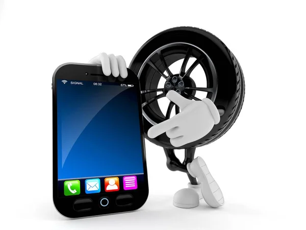Характер колеса автомобиля со смартфоном — стоковое фото