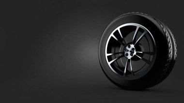 Gri arka planda araba lastiği