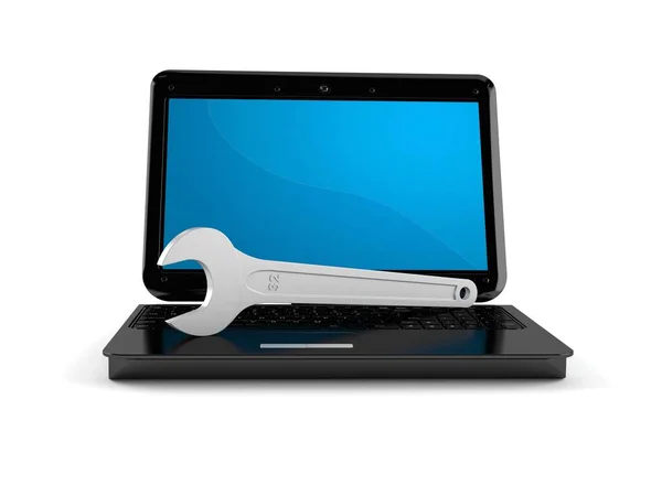 Laptop with wrench — Stock Photo, Image