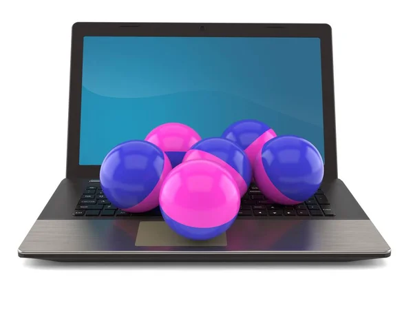 Bolas de Paintball com laptop — Fotografia de Stock