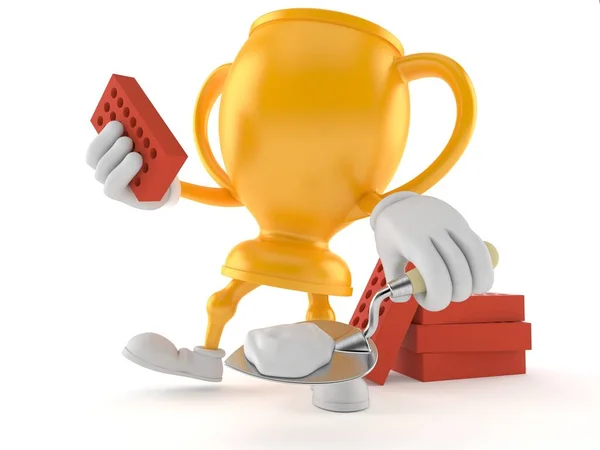 Golden trophy character with trowel and bricks — ストック写真