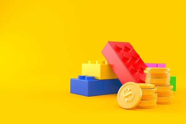 Blok mainan dengan tumpukan koin — Stok Foto