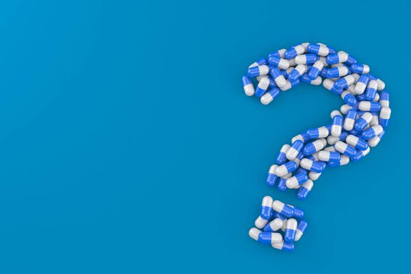 Знак вопроса, сделанный из таблетки
