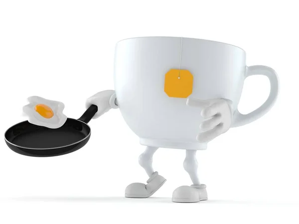 Чашка чая персонаж держа сковородку — стоковое фото