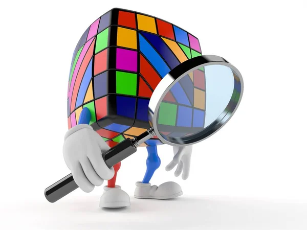 Toy puzzle character looking through magnifying glass — Stock Photo, Image