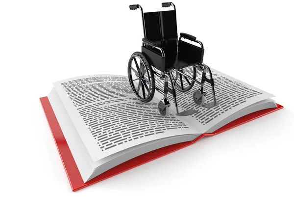 Fauteuil roulant sur livre ouvert — Photo