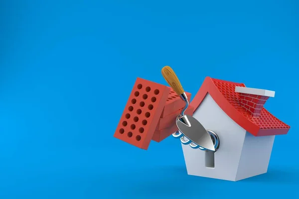 Trowel a cihly s malým domkem — Stock fotografie