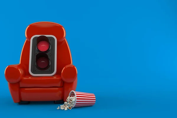 Rood verkeerslicht met theaterfauteuil en popcorn — Stockfoto