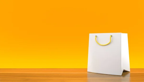 Shopping bag on orange background — Stock Photo, Image