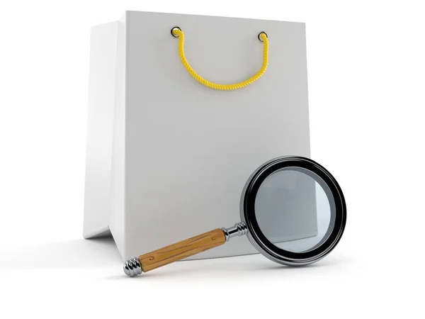 Shopping bag with magnifying glass — Stock Photo, Image