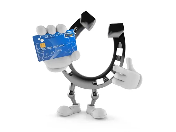 Caráter em ferradura com cartão de crédito — Fotografia de Stock