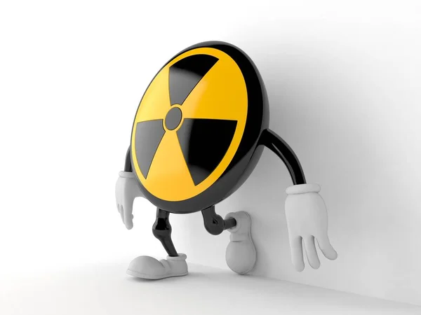 Radioactive character leaning on wall on white background — Stock Photo, Image