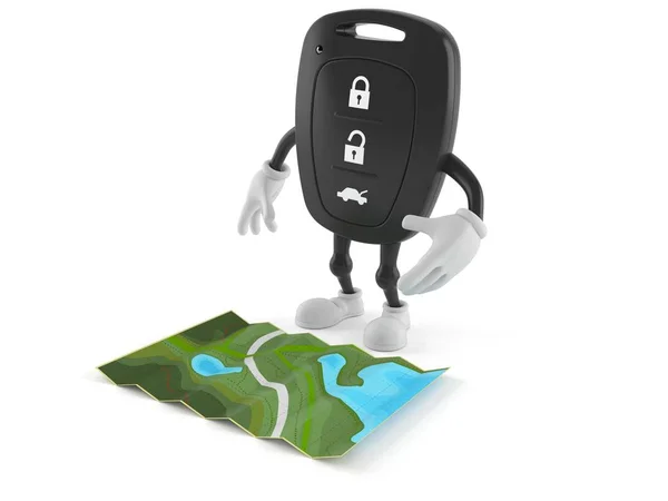 Car remote key character looking at map — Stock Photo, Image