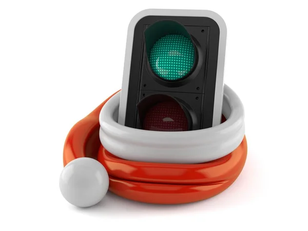 Green traffic light inside santa hat — Stock Photo, Image
