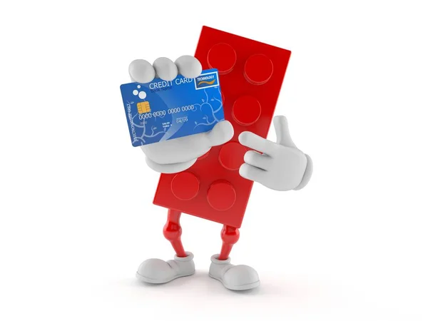 Caráter de brinquedo bloco segurando cartão de crédito — Fotografia de Stock