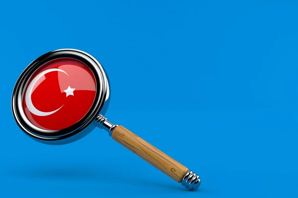 Увеличительное стекло с турецким флагом — стоковое фото