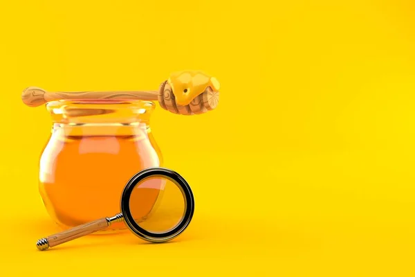 Botol Madu Dengan Kaca Pembesar Diisolasi Pada Latar Belakang Oranye — Stok Foto