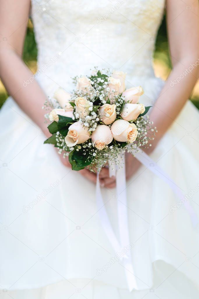 Bridal bouquet from roses. Wedding details.