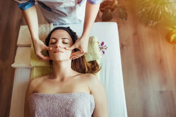 Lifting face massage with sugar gel