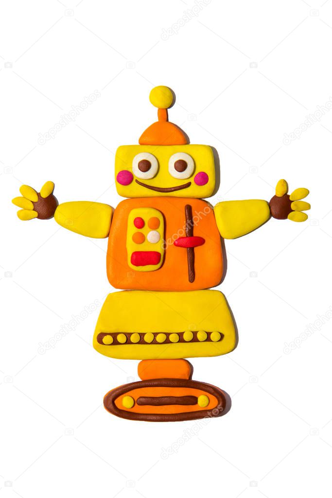 Cheerful yellow Plasticine robot isolated on a white background.