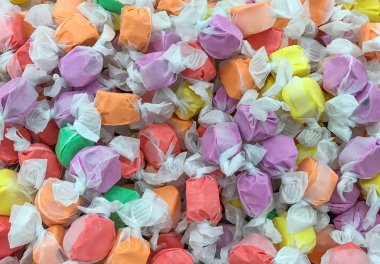 Saltwater Taffy Candy Background. clipart