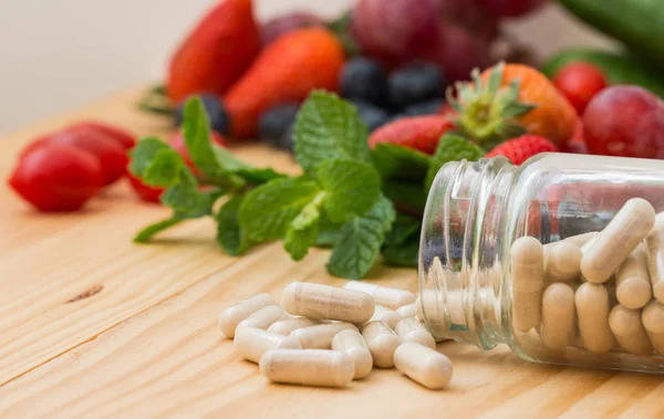 Vitamins supplements in the buttle. — Stock Photo, Image