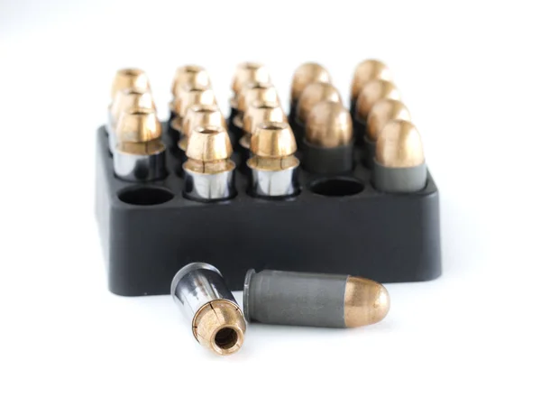 .45 Pistol bullets in a cartridge holder. — Stock Photo, Image