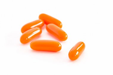 CoQ10 gel vitamin supplement capsules. clipart