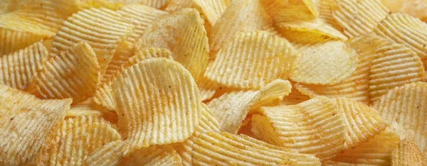 Bakgrund Wellpapp Gyllene Chips Med Konsistens — Stockfoto