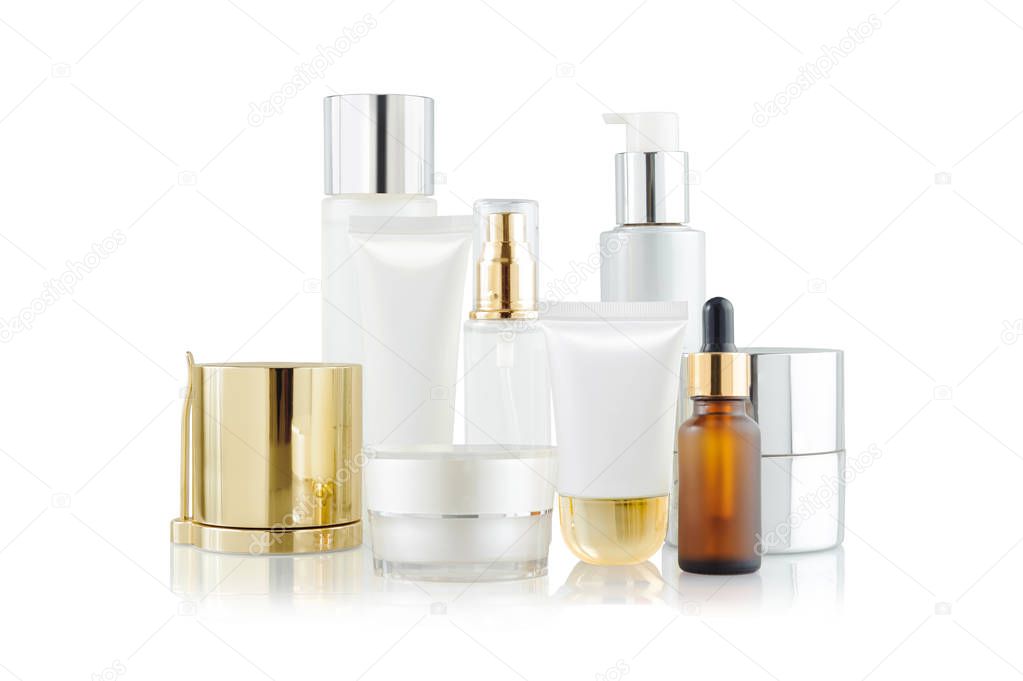 Set of cosmetic containers. Cosmetic product bottles, dispensers, droppers, jars and tubes isolated on white