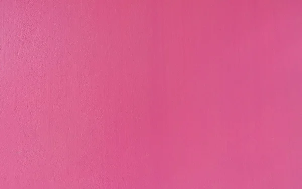 ピンクの壁のテクスチャ背景。光で — ストック写真