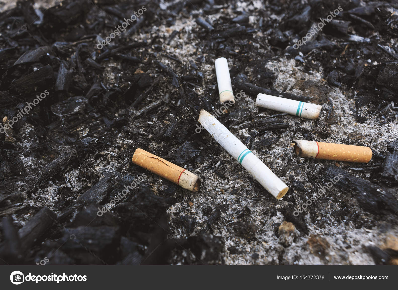 Cigarette Ashes On The Ground