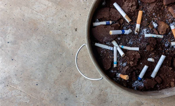 closeup ashtray from coffee bean mashed receptacle for tobacco. top view