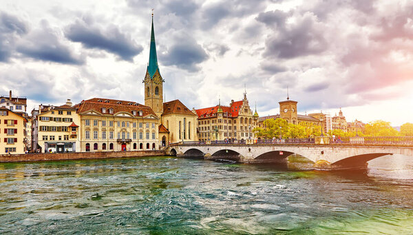 The Zurich, Switzerland. View of the historic city center with famous Fraumunster Church, on the Limmat river