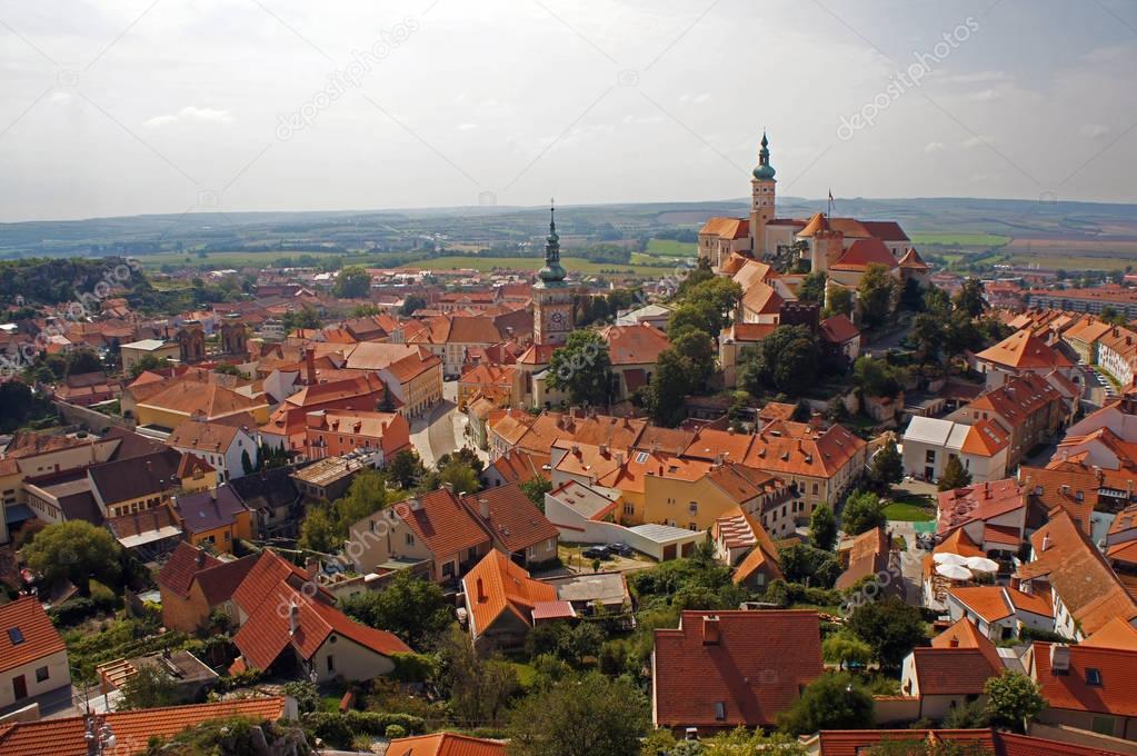 Red roofs of medieval town Mikulov and towers of the castle and the church in Moravia, Czech Republic.