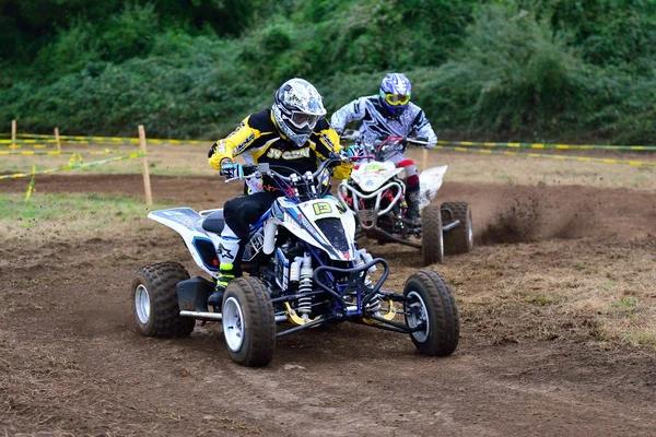 Unidentified racer rides a quad motorbike. — Stock Photo, Image